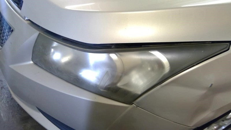 Driver Headlight With Chrome Bezel On Turn Signal Bulb Fits 11-12 CRUZ