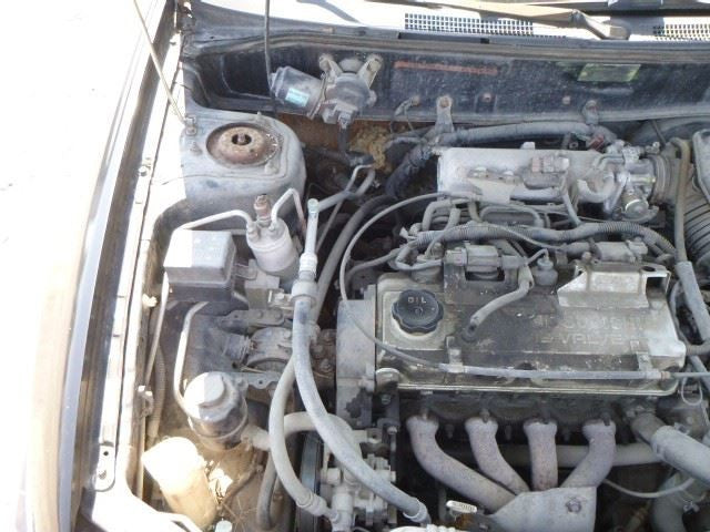 MIRAGE    2001 Fuel Filler Door 1400584