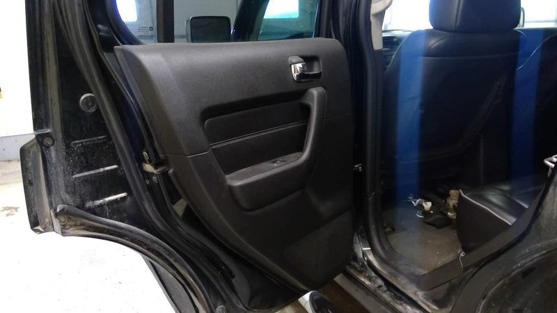 H3        2006 Door Trim Panel Rear 2028659