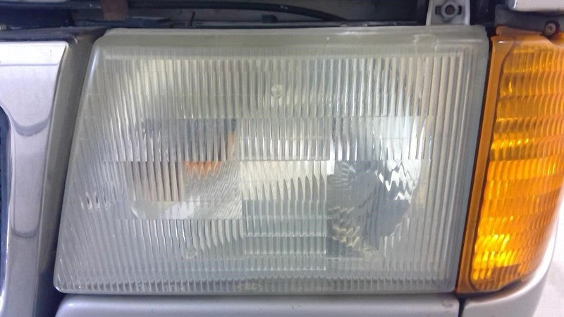 Driver Left Headlight Composite Fits 97-07 FORD E150 VAN 1850935